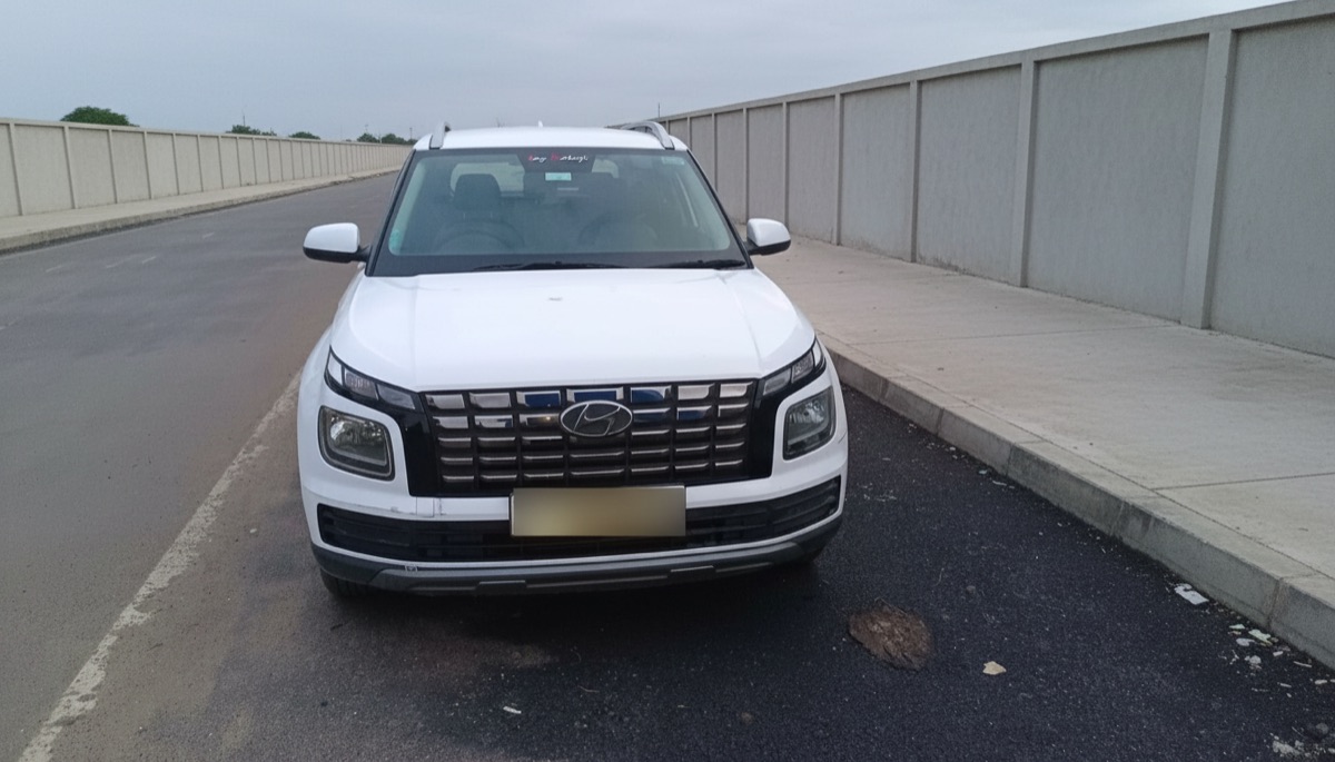 Guarded enhanced version of marketplace car photograph, example 7
